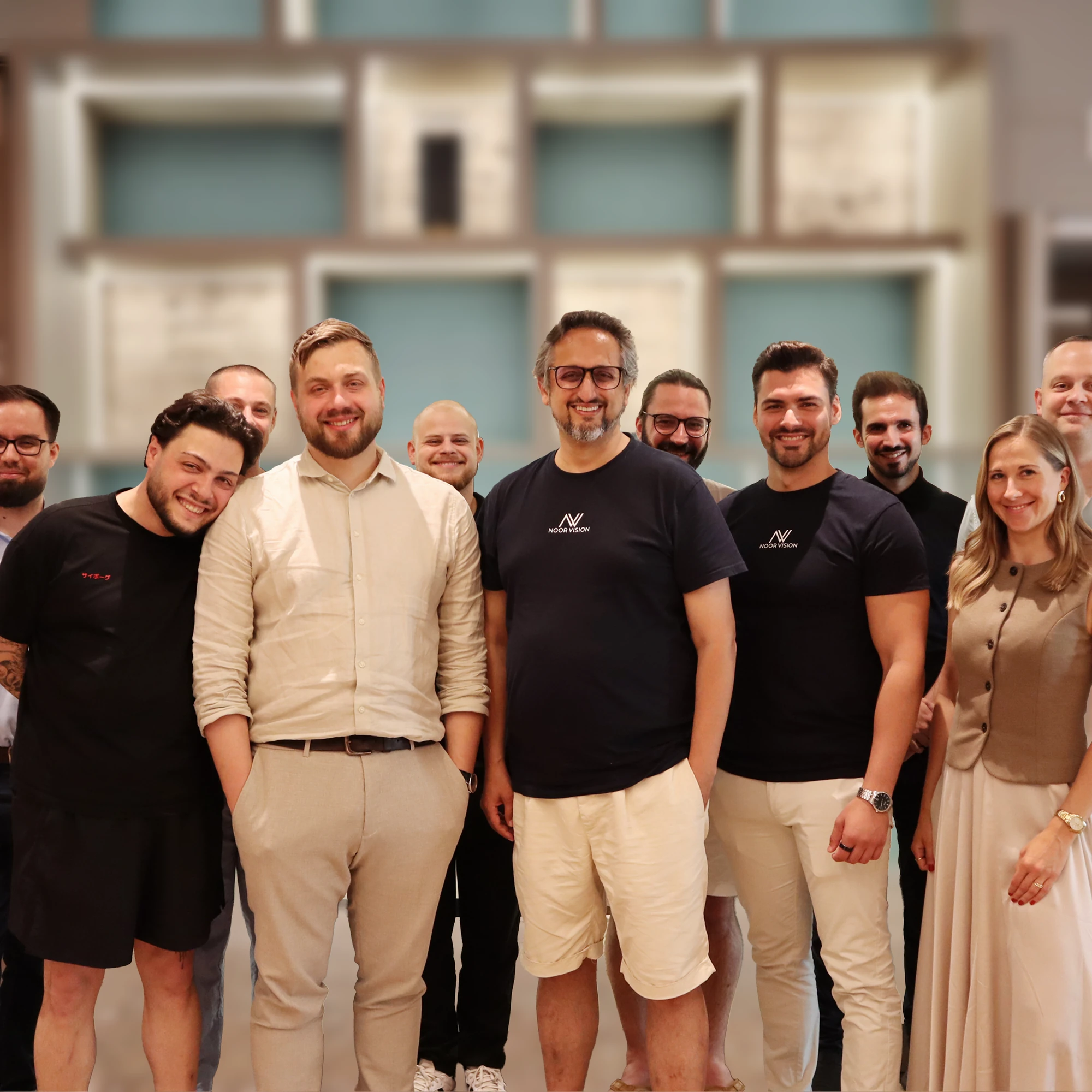 Noor Vision team, an SAP company, smiling together in a group photo